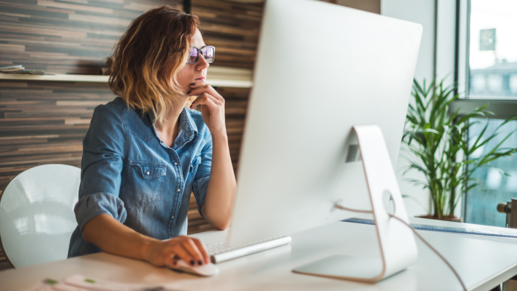 Woman Working at A Computer